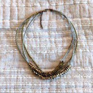 Short lightweight metal and woven layered necklace